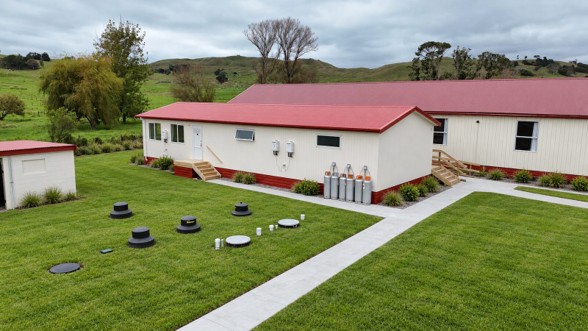 Ablution block at Otamatea Marae, Northland, with wastewater system, gas connections, concrete paths and new lawns